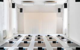 sol studio view towards the teacher backdrop view with mats layed out sol